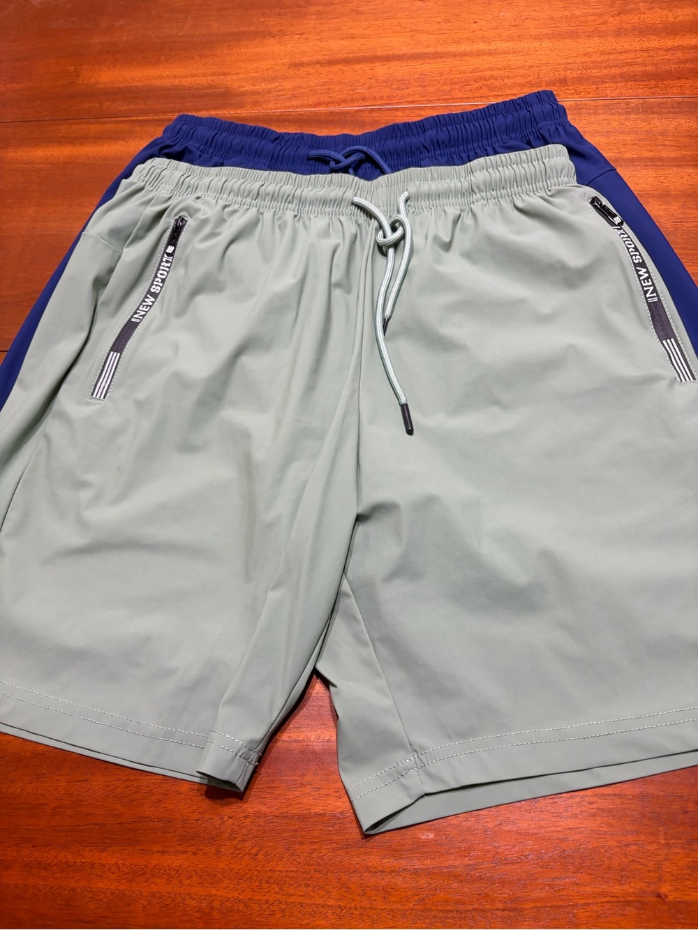 NEW SPORT Blue and light green Athletic Shorts with Zipper Detail